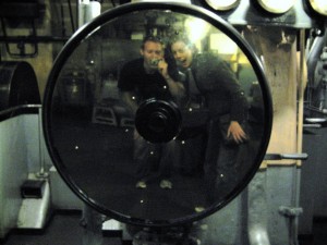 some reflective, polished steel thing. Perhaps an entertaining circus mirror for the engineers