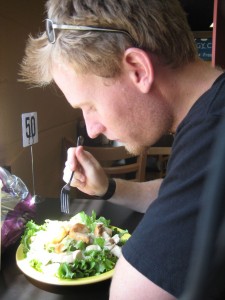 rob eating his manly ceasar salad. this is about the 100th ceasar salad he has had in america.